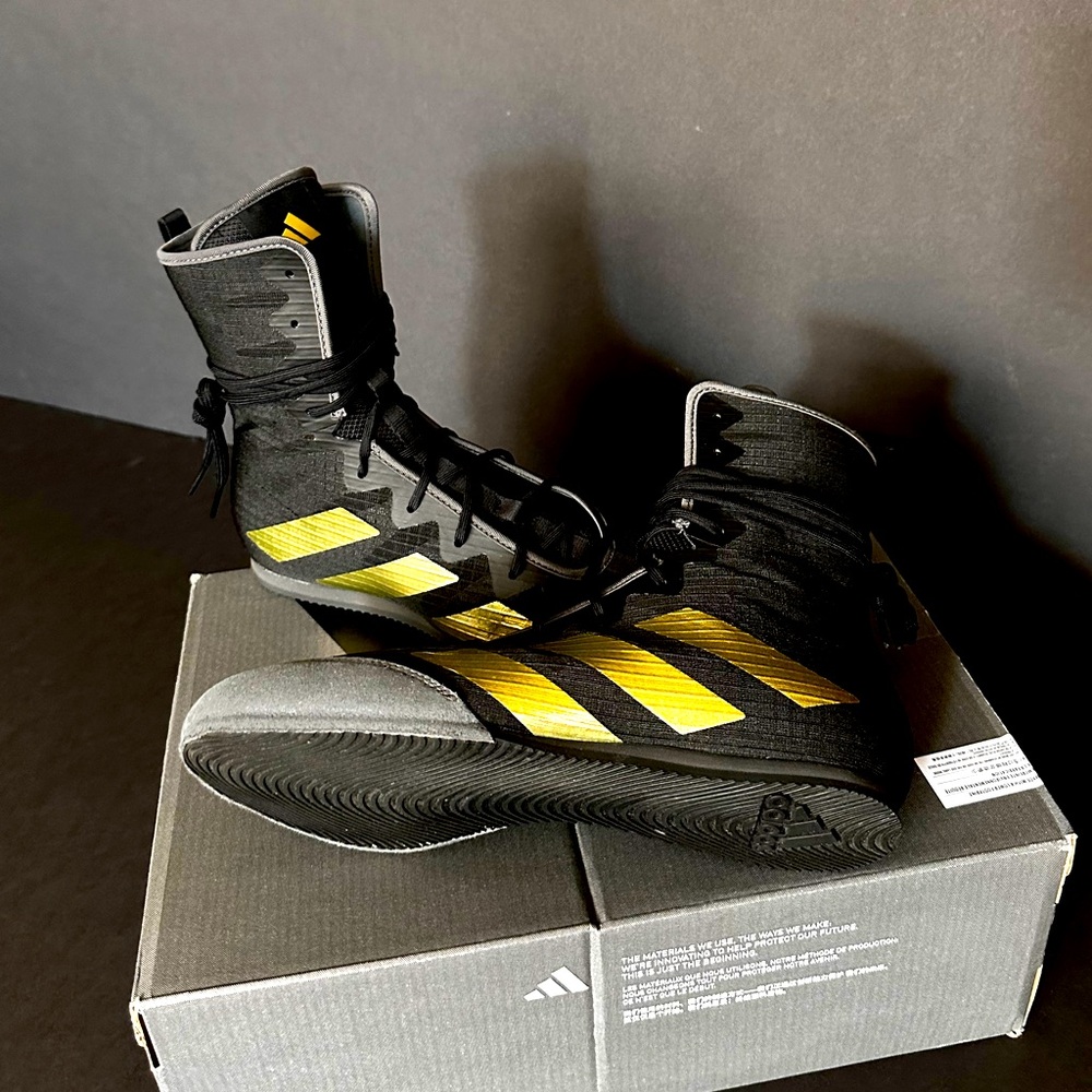 Box Hog 4 shoes-Core Black/Gold Metallic. Boxing has the power to change lives.